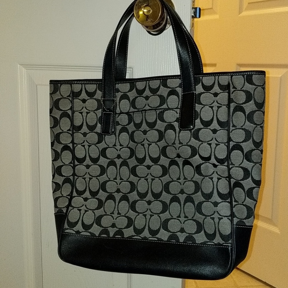 Black and gray coach purse
